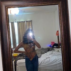 Y2K tie in the back top. Brand is INDOMARIO